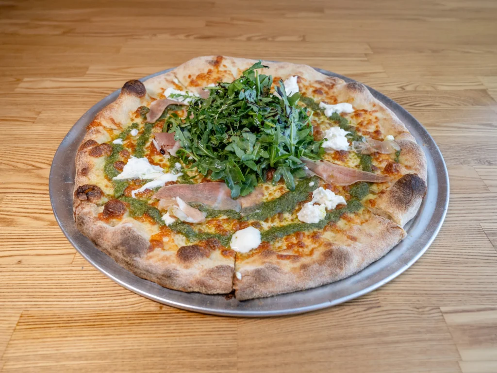 Mom Said Yes Pizza Torrance - The Detention Special - Pesto sauce, burrata, prosciutto de parma, arugula, lemon zest, balsamic glaze.