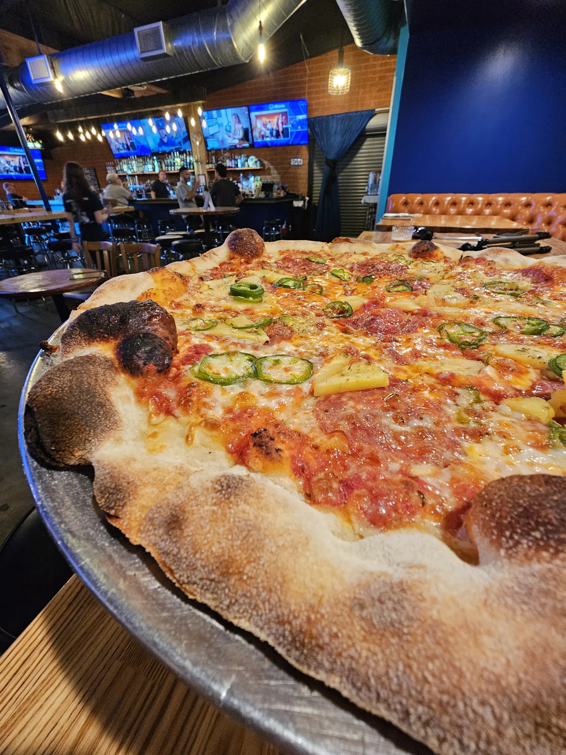 Hawaiian pizza close-up at Mom Said Yes in Torrance