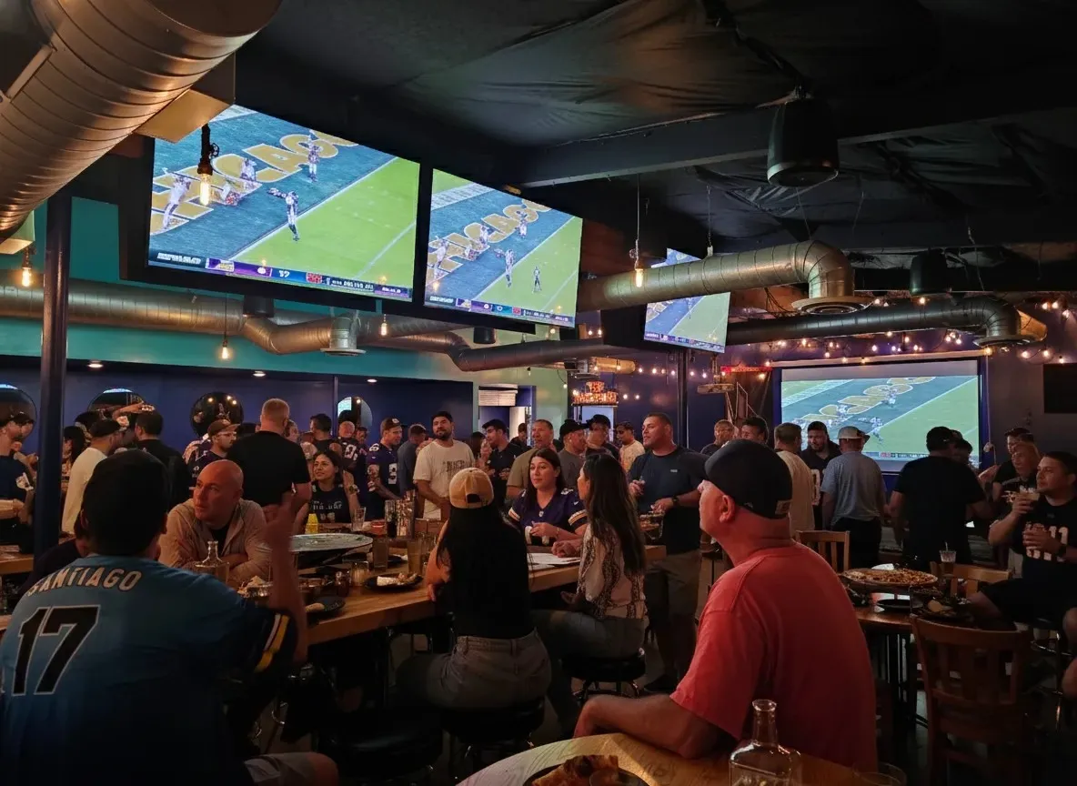 Crowd watching football at Mom Said Yes in Torrance