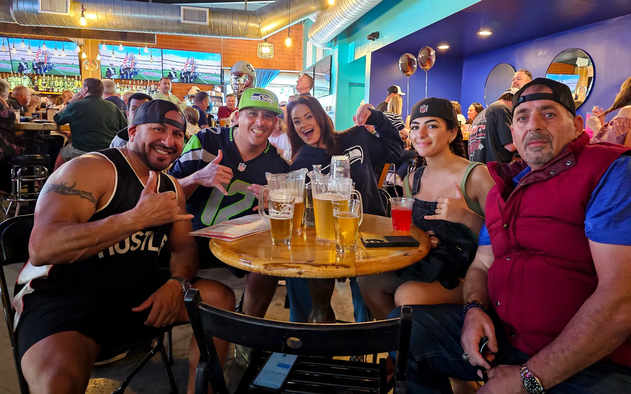 Mom Said Yes Pizza Torrance sports bar interior with screens and seating